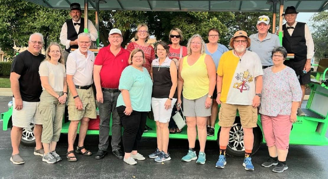 Group celebrating on the trolley